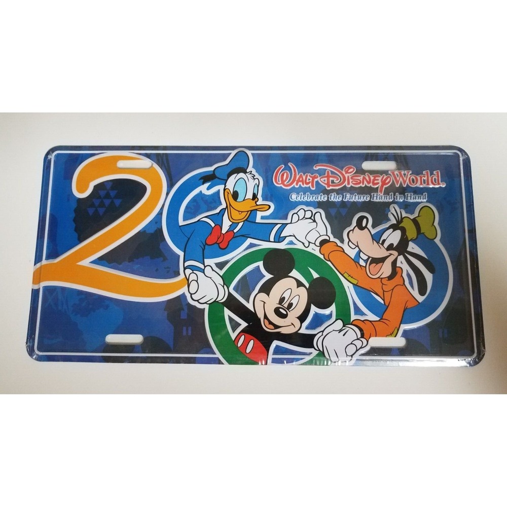 WDW Metal License Plate / Sign 2000 Celebrate The Future Hand In Hand New Sealed